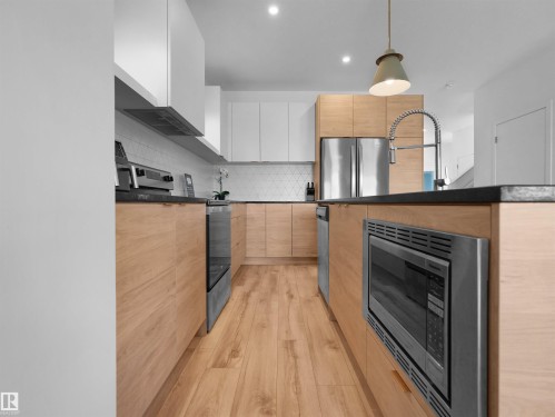 4597 66 Street, Beaumont, AB - Indoor Photo Showing Kitchen With Upgraded Kitchen