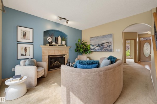 708 Haliburton Crescent Nw, Edmonton, AB - Indoor Photo Showing Living Room With Fireplace