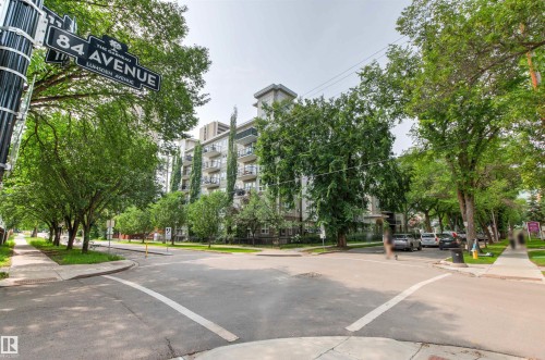 Modern multi-story building featuring multiple balconies and a concrete exterior - #404 11103 84 Av Nw, Edmonton, AB - Outdoor