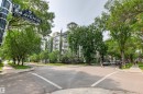 Modern multi-story building featuring multiple balconies and a concrete exterior - #404 11103 84 Av Nw, Edmonton, AB  - Outdoor 