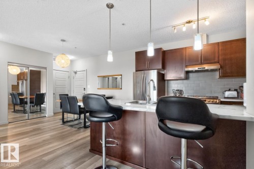 #307 1144 Adamson Dr Sw Sw, Edmonton, AB - Indoor Photo Showing Kitchen With Stainless Steel Kitchen With Upgraded Kitchen