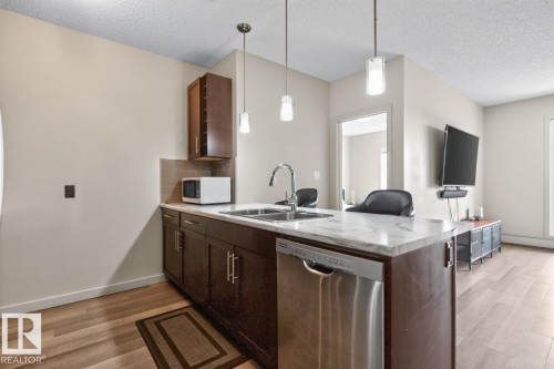 #307 1144 Adamson Dr Sw Sw, Edmonton, AB - Indoor Photo Showing Kitchen With Double Sink