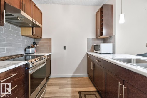 #307 1144 Adamson Dr Sw Sw, Edmonton, AB - Indoor Photo Showing Kitchen