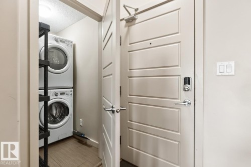 #307 1144 Adamson Dr Sw Sw, Edmonton, AB - Indoor Photo Showing Laundry Room