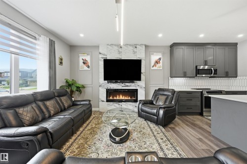 3 Penn Place, Spruce Grove, AB - Indoor Photo Showing Living Room With Fireplace