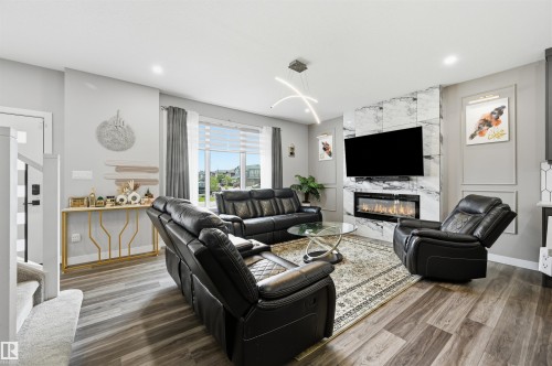 3 Penn Place, Spruce Grove, AB - Indoor Photo Showing Living Room With Fireplace