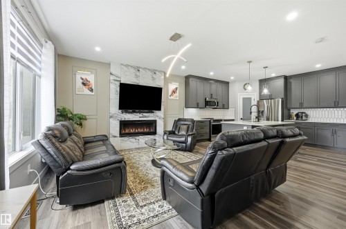 3 Penn Place, Spruce Grove, AB - Indoor Photo Showing Living Room With Fireplace