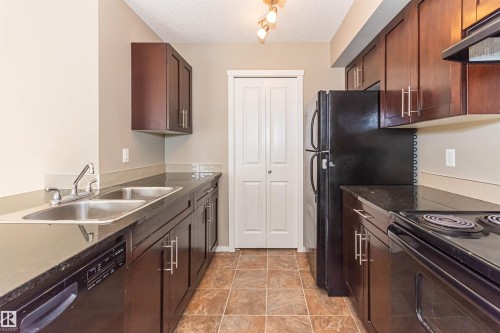 5816 Mullen Place Nw, Edmonton, AB - Indoor Photo Showing Kitchen With Double Sink