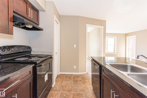 5816 Mullen Place Nw, Edmonton, AB - Indoor Photo Showing Kitchen With Double Sink