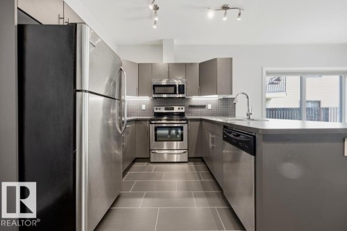 #105 10611 117 St Nw, Edmonton, AB - Indoor Photo Showing Kitchen With Upgraded Kitchen