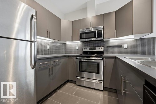 #105 10611 117 St Nw, Edmonton, AB - Indoor Photo Showing Kitchen With Upgraded Kitchen