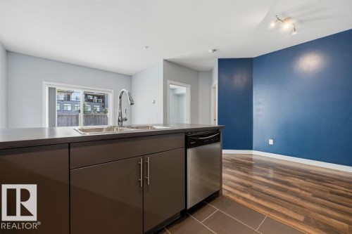 #105 10611 117 St Nw, Edmonton, AB - Indoor Photo Showing Kitchen With Double Sink