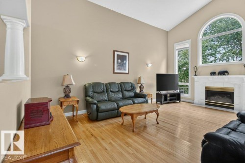 925 Burrows Crescent Nw, Edmonton, AB - Indoor Photo Showing Living Room With Fireplace