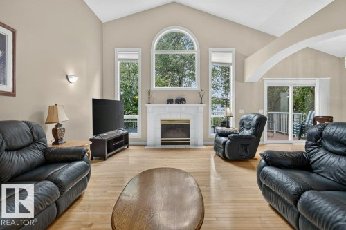 925 Burrows Crescent Nw, Edmonton, AB - Indoor Photo Showing Living Room With Fireplace