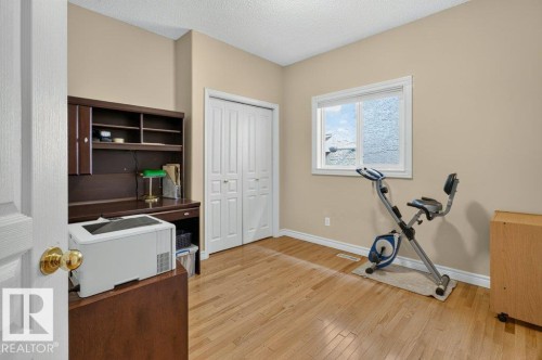 925 Burrows Crescent Nw, Edmonton, AB - Indoor Photo Showing Gym Room