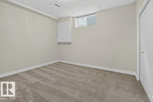 925 Burrows Crescent Nw, Edmonton, AB - Indoor Photo Showing Other Room