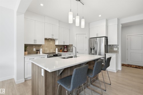 185 Larch Crescent, Leduc, AB - Indoor Photo Showing Kitchen With Stainless Steel Kitchen With Double Sink With Upgraded Kitchen