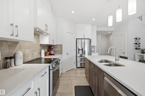 185 Larch Crescent, Leduc, AB - Indoor Photo Showing Kitchen With Stainless Steel Kitchen With Double Sink With Upgraded Kitchen