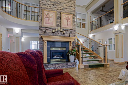 #131 11260 153 Av Nw, Edmonton, AB - Indoor With Fireplace