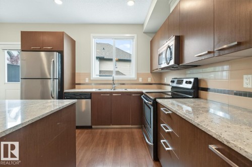 #8 655 Watt Bv Sw, Edmonton, AB - Indoor Photo Showing Kitchen With Double Sink