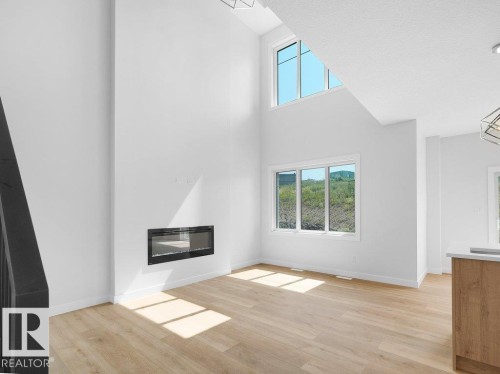 1433 Osprey Crest Nw, Edmonton, AB - Indoor With Fireplace