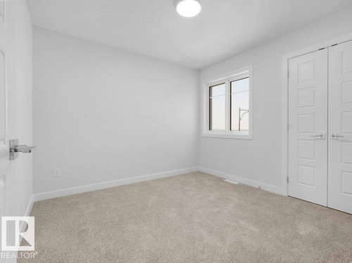 1433 Osprey Crest Nw, Edmonton, AB - Indoor Photo Showing Other Room