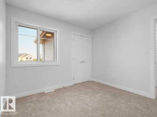 1433 Osprey Crest Nw, Edmonton, AB - Indoor Photo Showing Other Room