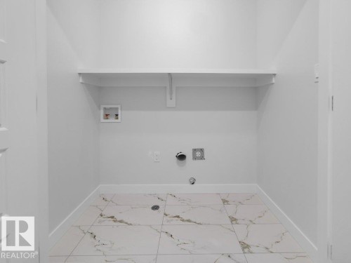 1433 Osprey Crest Nw, Edmonton, AB - Indoor With Storage