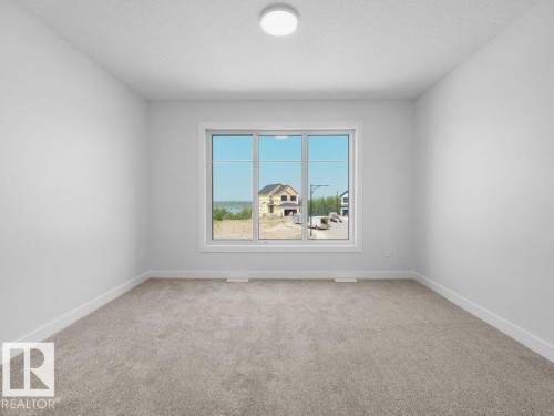 1433 Osprey Crest Nw, Edmonton, AB - Indoor Photo Showing Other Room