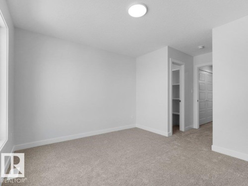 1433 Osprey Crest Nw, Edmonton, AB - Indoor Photo Showing Other Room