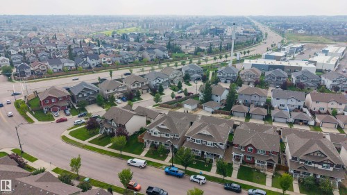 Aerial perspective showcasing a residential area with varied housing styles - 124 Cy Becker Boulevard Nw, Edmonton, AB - Outdoor With View