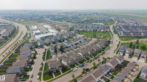 Expansive aerial perspective showcasing a residential neighborhood with varied architectural styles - 124 Cy Becker Boulevard Nw, Edmonton, AB -  With View