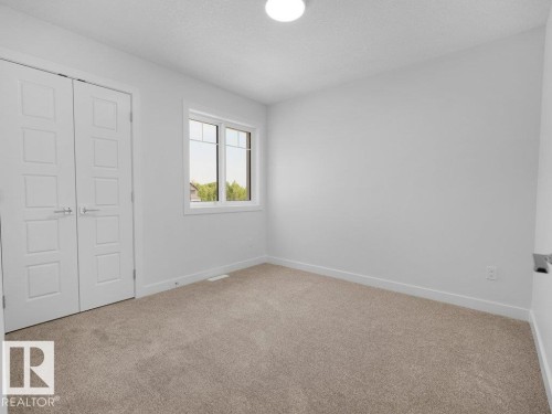 1423 Osprey Crest Nw, Edmonton, AB - Indoor Photo Showing Other Room
