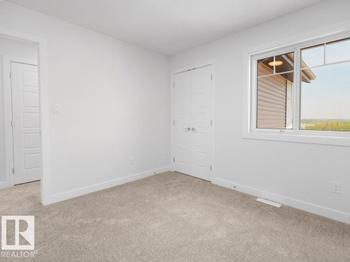 1423 Osprey Crest Nw, Edmonton, AB - Indoor Photo Showing Other Room