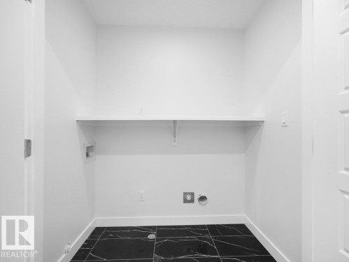 1423 Osprey Crest Nw, Edmonton, AB - Indoor With Storage
