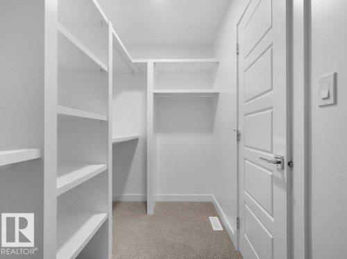 1423 Osprey Crest Nw, Edmonton, AB - Indoor With Storage