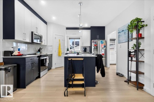 82 Wyatt Ridge, Fort Saskatchewan, AB - Indoor Photo Showing Kitchen With Upgraded Kitchen