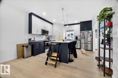 82 Wyatt Ridge, Fort Saskatchewan, AB - Indoor Photo Showing Kitchen With Upgraded Kitchen