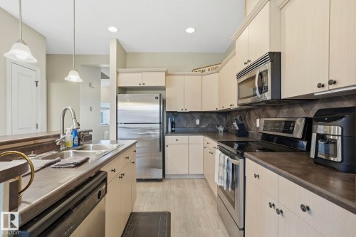 #52 13825 155 Av Nw, Edmonton, AB - Indoor Photo Showing Kitchen With Stainless Steel Kitchen With Double Sink With Upgraded Kitchen