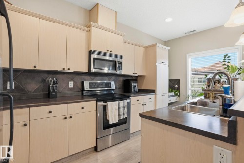 #52 13825 155 Av Nw, Edmonton, AB - Indoor Photo Showing Kitchen With Double Sink