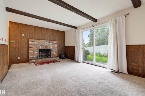 10912 34A Avenue Nw, Edmonton, AB - Indoor Photo Showing Other Room With Fireplace