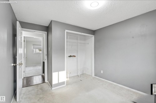 Neutral-toned walls with carpeted flooring - 13604 90A Street Nw, Edmonton, AB - Indoor Photo Showing Other Room