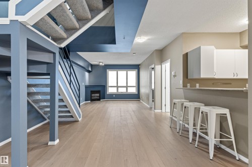 #417 10717 83 Av Nw, Edmonton, AB - Indoor With Fireplace