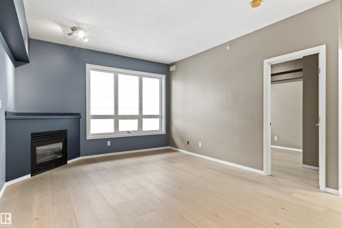 #417 10717 83 Av Nw, Edmonton, AB - Indoor With Fireplace