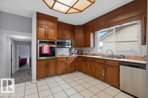 3205 104A Street Nw, Edmonton, AB - Indoor Photo Showing Kitchen With Double Sink
