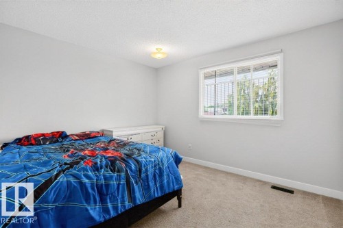 3205 104A Street Nw, Edmonton, AB - Indoor Photo Showing Bedroom