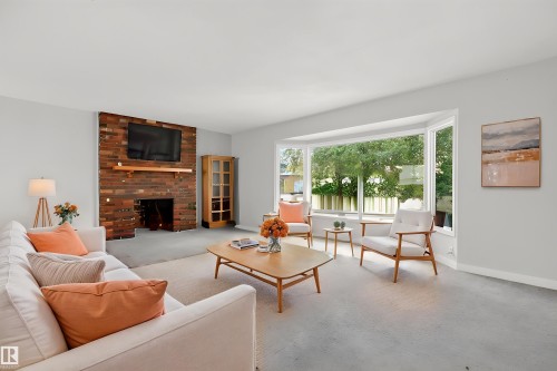 3205 104A Street Nw, Edmonton, AB - Indoor Photo Showing Living Room With Fireplace