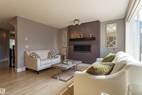 522 174A Street Sw, Edmonton, AB - Indoor Photo Showing Living Room With Fireplace