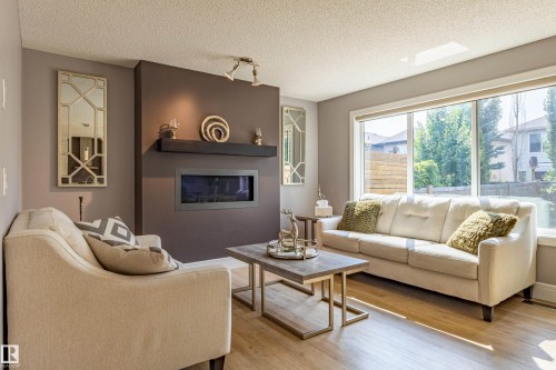 522 174A Street Sw, Edmonton, AB - Indoor Photo Showing Living Room With Fireplace