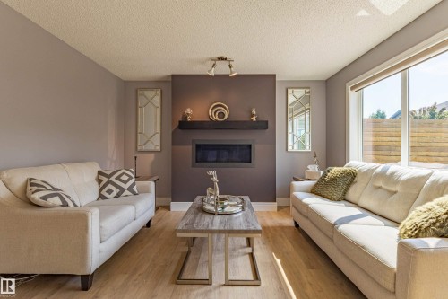 522 174A Street Sw, Edmonton, AB - Indoor Photo Showing Living Room With Fireplace